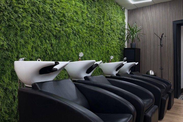 Wash bays and living wall inside Hairlift Studio, Dublin